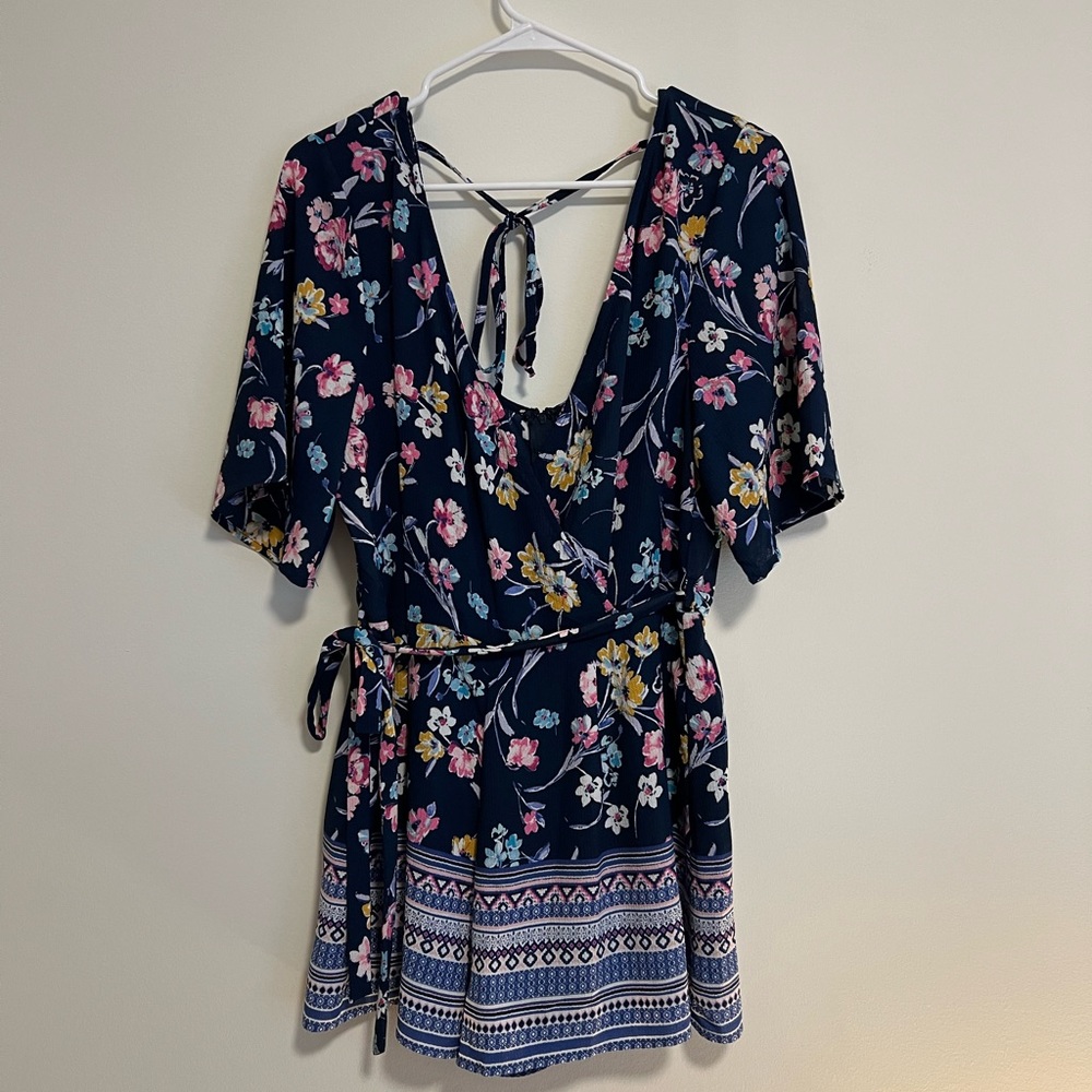 Navy blue floral romper from Francesca’s